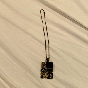 GUC unusual necklace in brown and other earth tones plus earrings